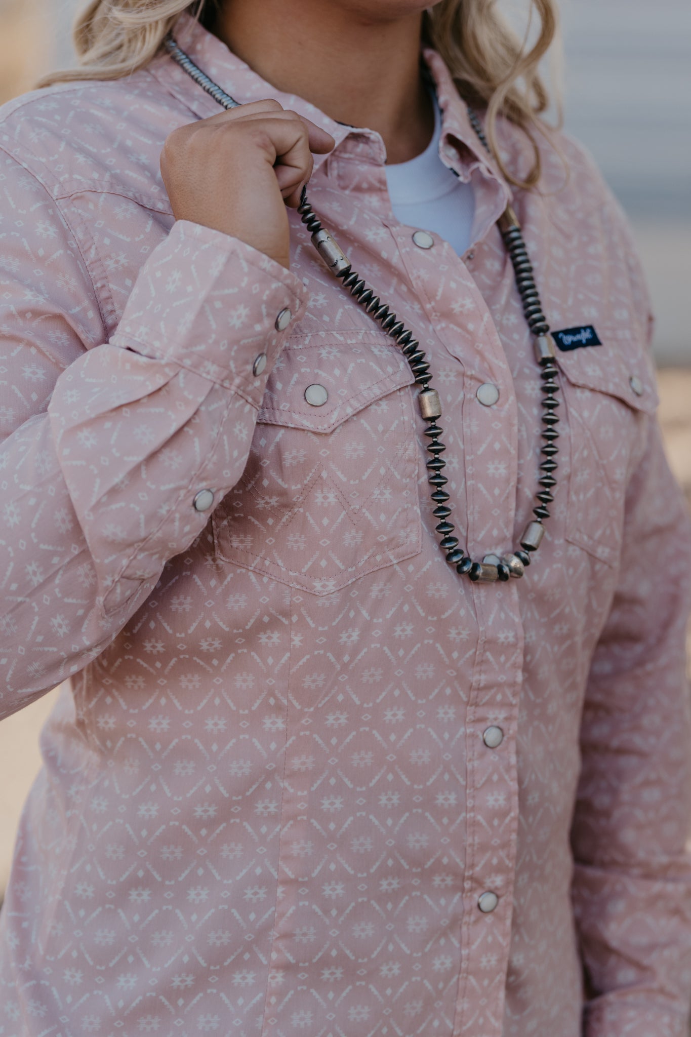 Claire Pearl Snap Top